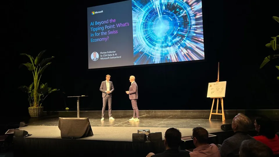 On stage for the talk "AI Beyond the Tipping Point: What's in for the Swiss Economy?"